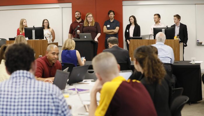 Participants present their policy recommendations during one of the plenary sessions.